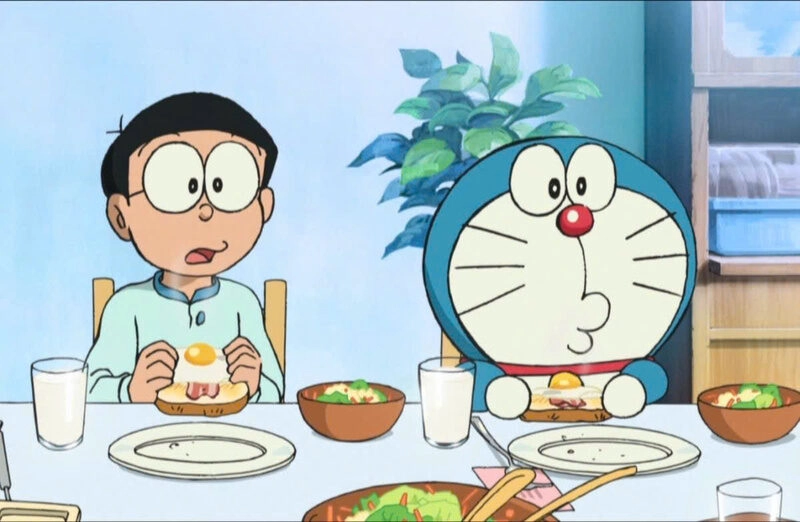 Hình ảnh Doraemon cute đang ăn