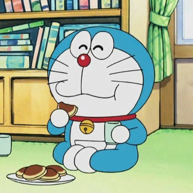 Hình ảnh Doraemon cute đang ăn